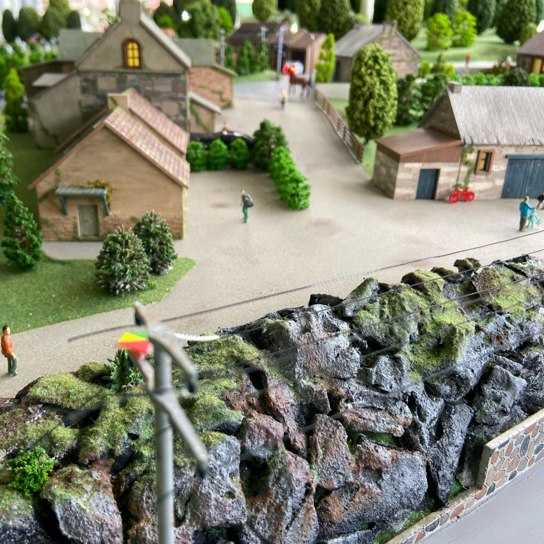 A detailed display of various historical architectural models representing different eras.