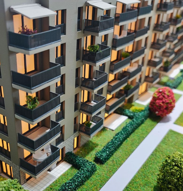A masterfully crafted urban planning model by ARI Model, combining traditional craftsmanship and modern technology. This model presents a detailed city plan, showcasing transport infrastructure, green spaces, and public amenities. Such models are inv
