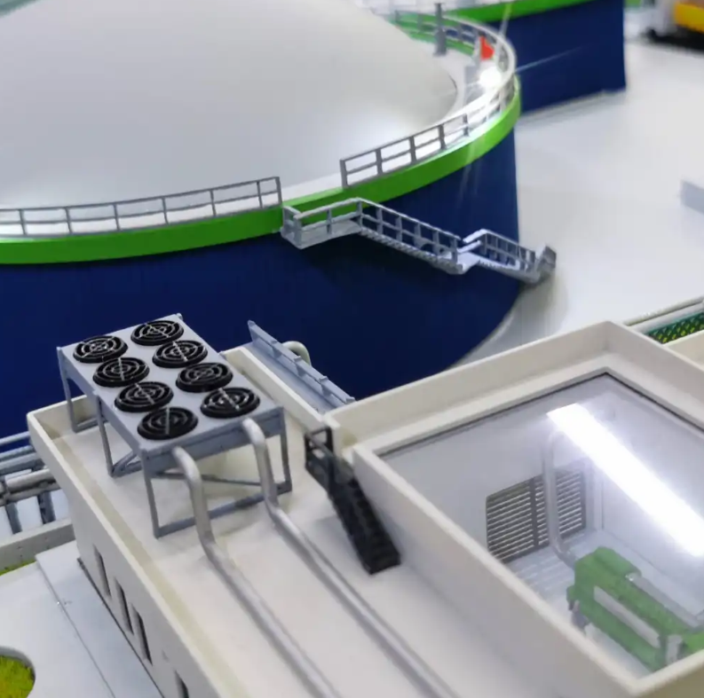 Extremely detailed, lit, and animated architectural model created by ARI Model for an exhibitor at EnergyDecentral. Featuring a realistic depiction of a renewable power plant, the model includes energy transmission paths lit with LEDs, interactive mo