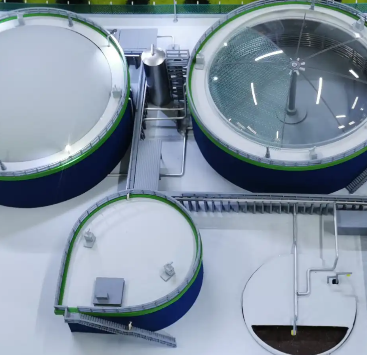One-of-a-kind architectural model by ARI Model, designed exclusively for an EnergyDecentral exhibitor. The model features a biogas facility and hydrogen refueling station with LED-illuminated energy routes, dynamically interactive motion systems, and