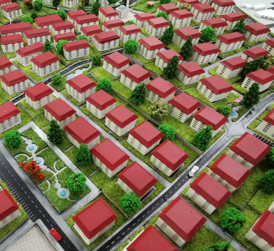 The richly detailed lit and animated scale model created by ARI Model for a municipality exhibited at Salon des Maires. The model is shown to illustrate areas of zoning, public services, and traffic flows through motion, lighting effects, and transpa