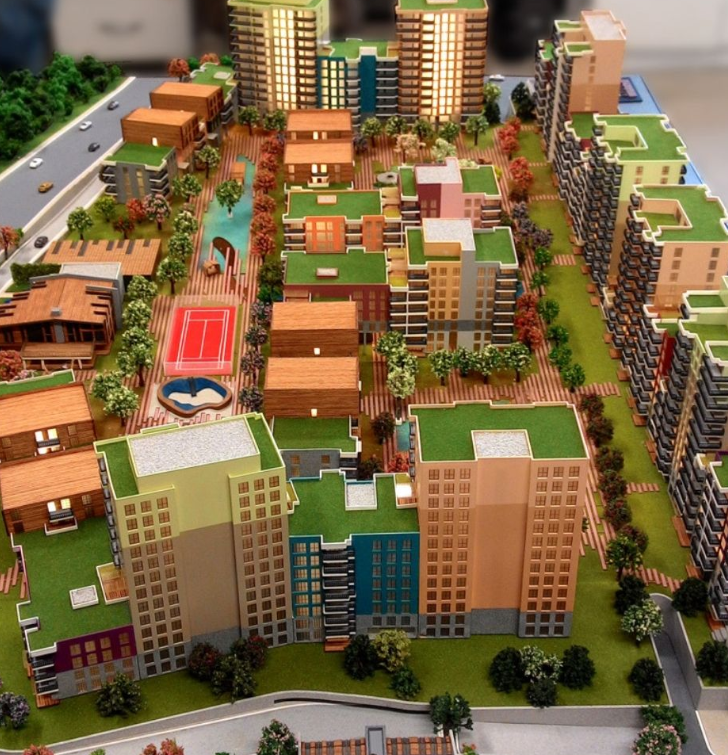 ARI Model producing a professional and detailed architectural scale model for a construction and infrastructure stand at INTERMAT. The model has roadways, building plans and site plans, and building elevations in high-resolution mini scale with reali