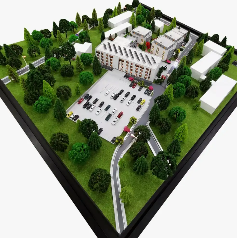 A specially crafted physical scale model by ARI Model at the Batimat trade fair, with innovative architectural designs, detailed structural plans, and contemporary design elements. The model has life-like textures, correct scale, and neat spatial arr