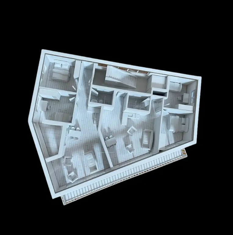 A highly detailed lighted and animated architectural model by ARI Model, exhibited at the Batimat show. The model features movable parts, lighted infrastructure, and realistic textures that mimic real-world environments. Highlighted sections emphasiz