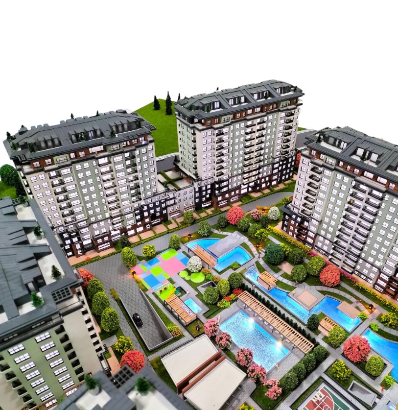 A high-end lighted and animated architectural scale model designed by ARI Model for Expo Real. The model includes interactive light, movement, and high-end visual storytelling concepts. It presents real estate development and city infrastructure proj