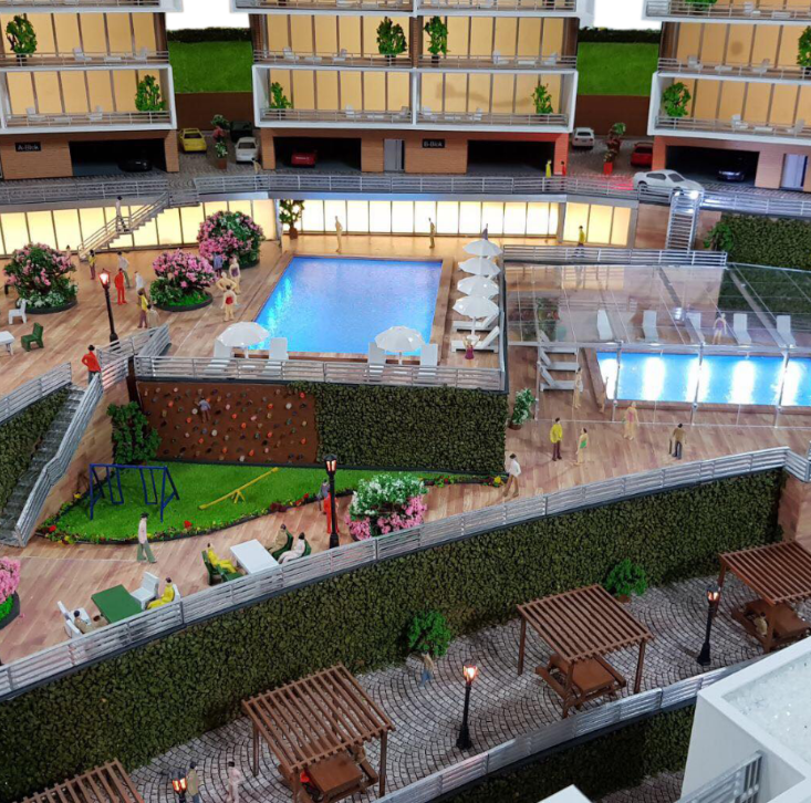 A completely custom scale model by ARI Model for Immo Messe Schweiz. The model has precise architectural detail, integrated lighting, and detailed landscaping, offering a presentation-ready and visually striking solution for developers. Designed to m