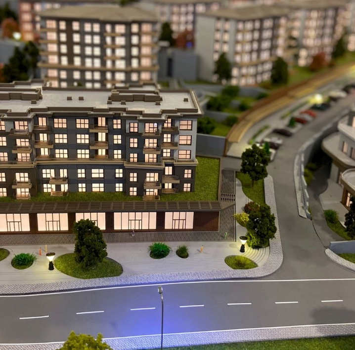 A custom illuminated and animated architectural model designed by ARI Model for Salon des Vacances, featuring realistic lighting, dynamic animations, and fine craftsmanship to display hotels, resorts, travel destinations, and tourism projects in a vi