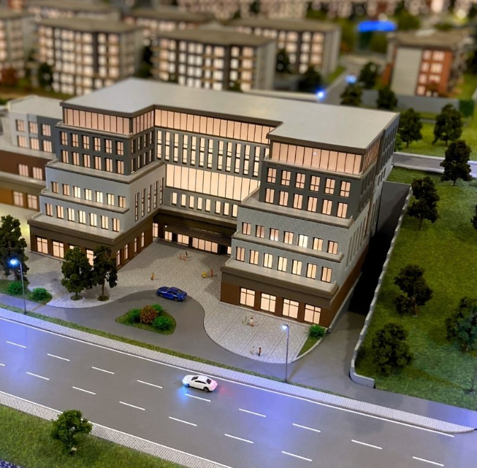 A custom-built architectural scale model by ARI Model for Salon des Vacances, featuring precision detailing, advanced lighting, and animation. These bespoke models, designed for exhibitions, tourism, and architecture, attract audiences through visual