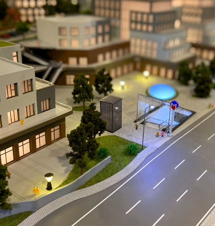 A bespoke architectural scale model designed by ARI Model for Travel Expo, featuring advanced lighting, motion integration, and realistic detailing. This illuminated and animated model enhances project presentations, attracts visitors, and reinforces