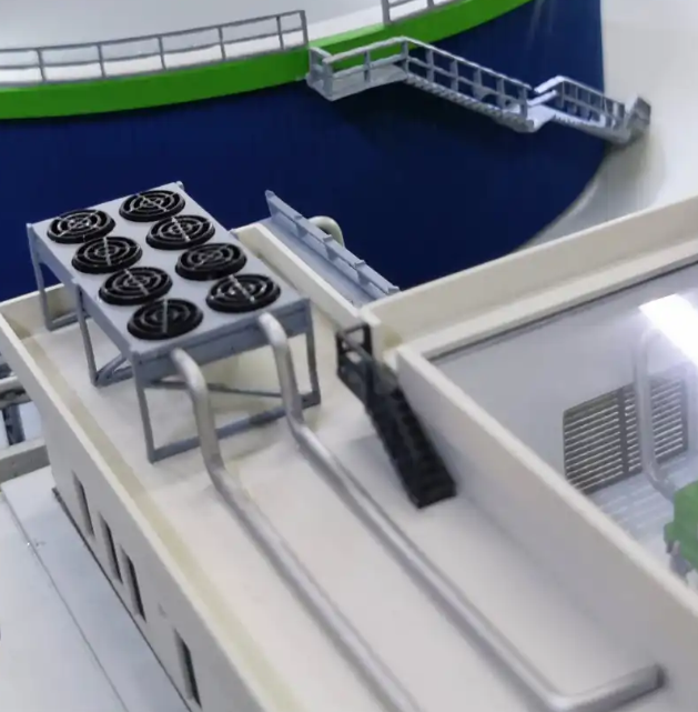 A detailed illuminated and animated scale model crafted by ARI Model for Interpädagogica, featuring modern educational infrastructures, smart learning environments, and digital training facilities. With integrated lighting systems, motion effects, an