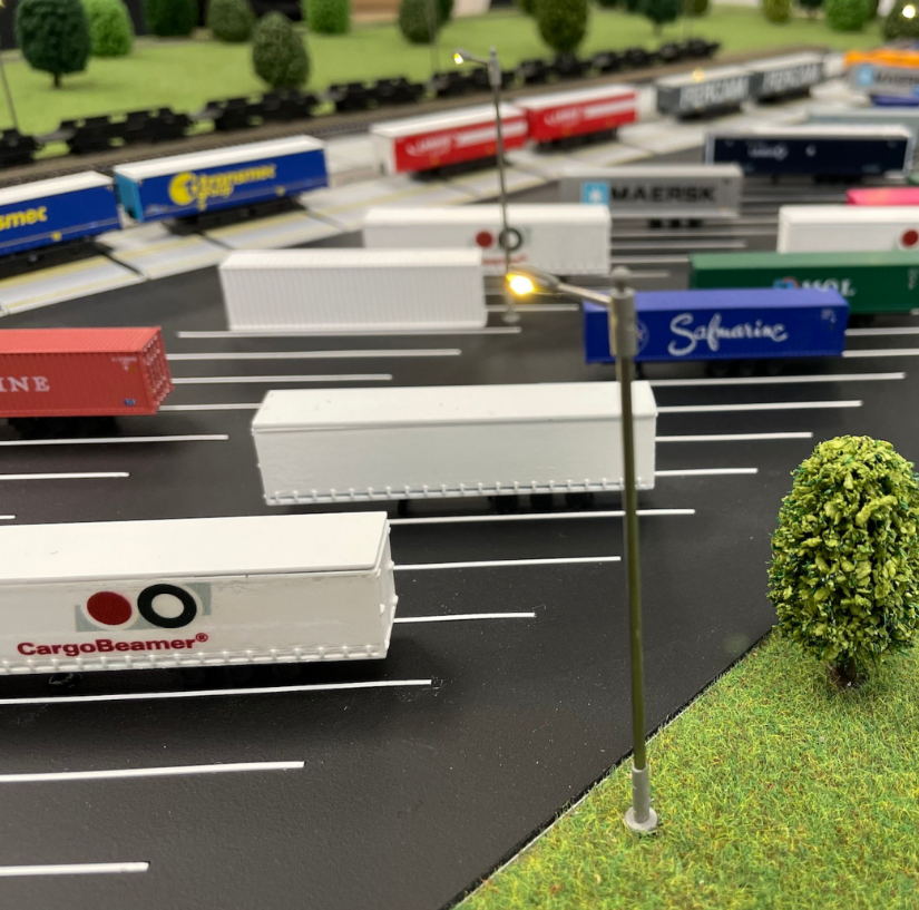 A custom-built exhibition model designed by ARI Model for Top Transport Europe, merging lighting technology, animation systems, and architectural precision to demonstrate innovation within the transport and logistics sectors. With more than two decad