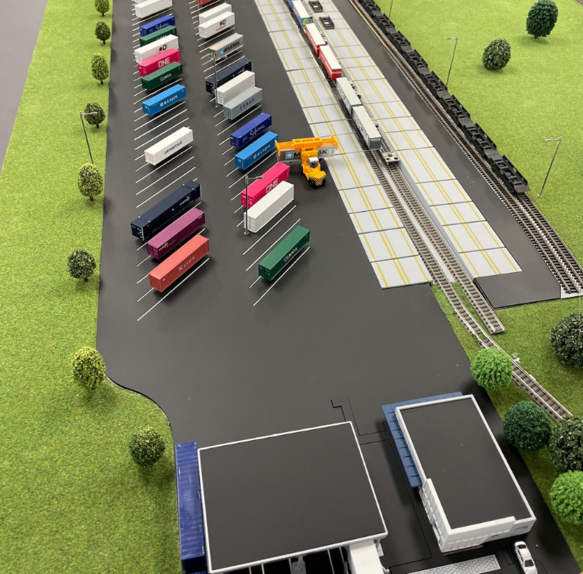 A custom-designed physical scale model created by ARI Model for ICT & Logistiek, combining light, motion, and architectural precision. This model merges creativity and technical mastery to bring logistics and ICT concepts to life, offering a visu