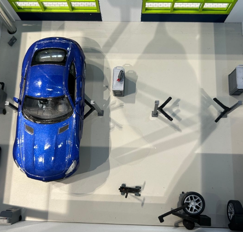 A customized logistics exhibition model engineered entirely by ARI Model, showcasing refined architectural detailing, motion mechanics, warehouse interpretation zones, illuminated routing paths, and supply chain visualizations. Built specifically for