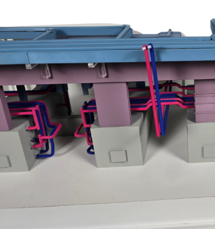 Illuminated and animated intralogistics model by ARI Model, featuring automation flow, warehouse routing, and advanced material-handling systems.
