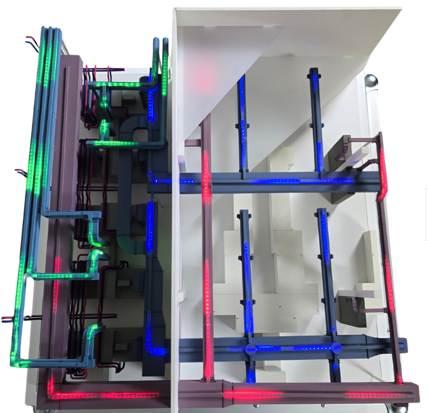 Short illuminated industrial logistics model by ARI Model, showing crane systems, machinery flow, and construction operations.
